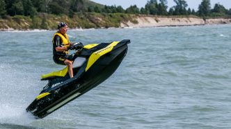 man riding personal watercraft